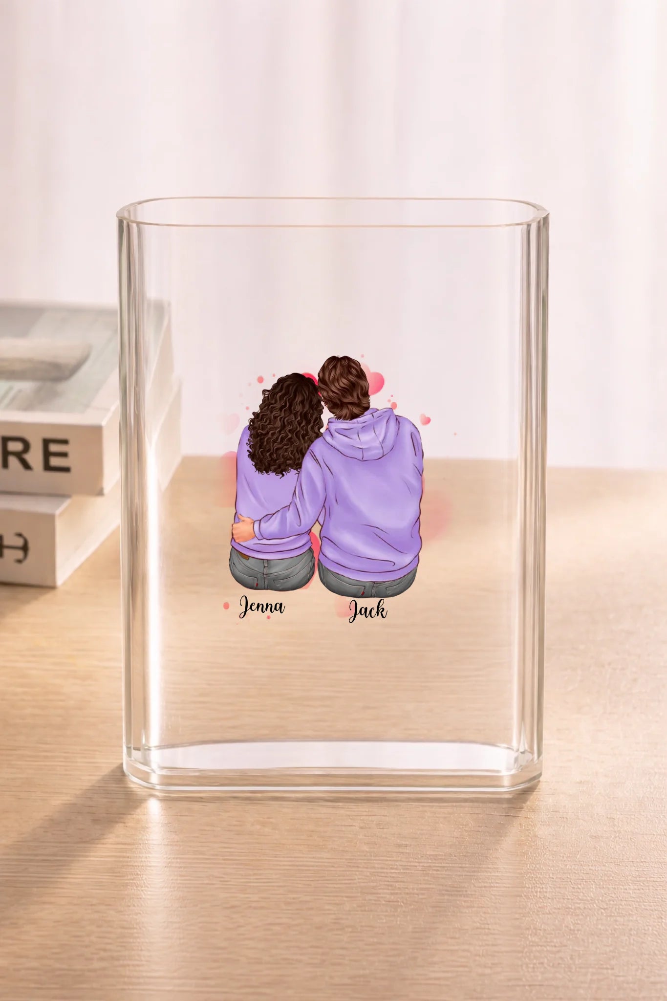 Clear acrylic vase on wood surface