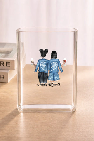 Clear acrylic vase on wood surface