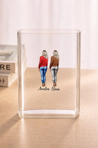 Clear acrylic vase on wood surface