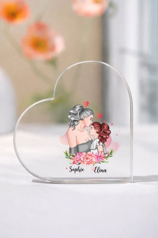 Clear acrylic heart ornament on white