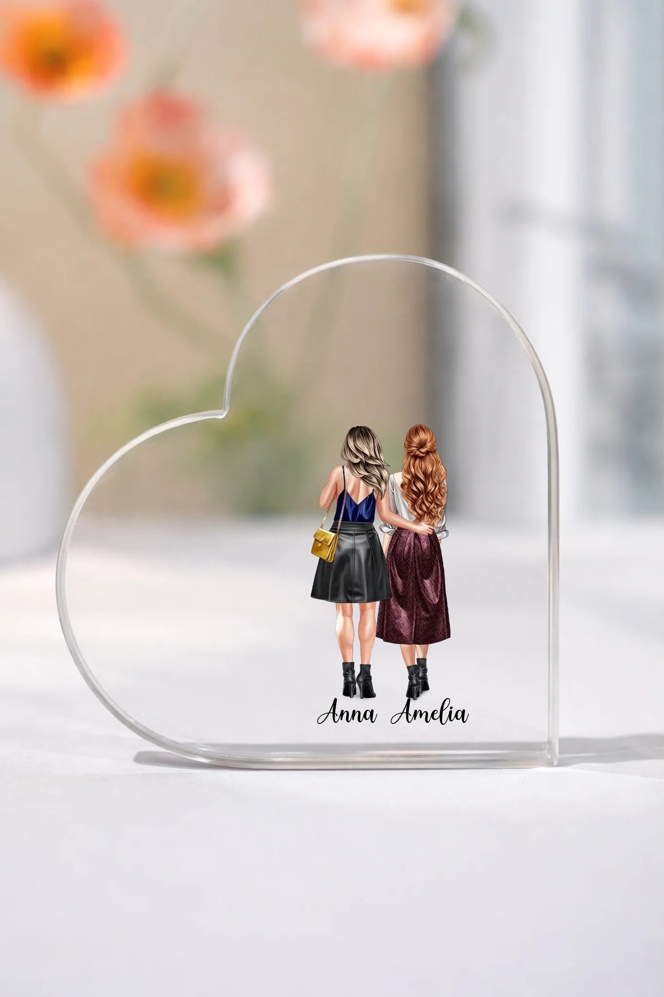 Clear acrylic heart ornament on white