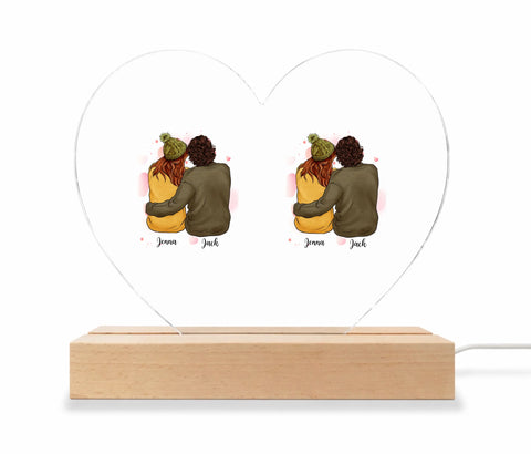 Clear heart on light wood base